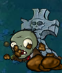 An ambush zombie appearing from a grave