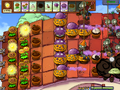 Final wave. The Pumpkins should protect the Gloom-shroom from zombies dropped by Bungee Zombies. I also used Squash on the Catapult Zombie to end the level faster.